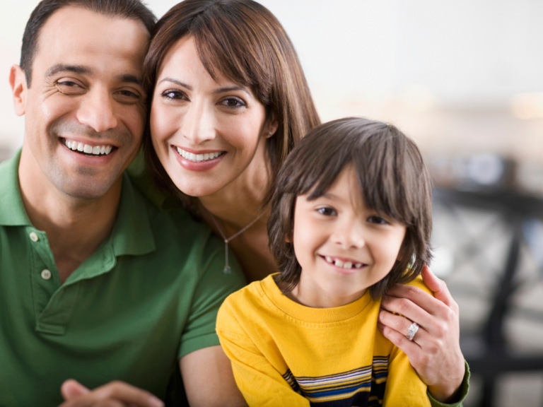 family dentist examining child at Princeview Dental